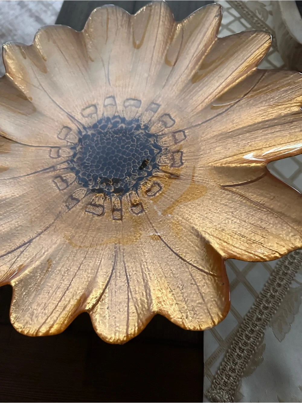 Gold sunflower glass decorative plate on a pedestal stand